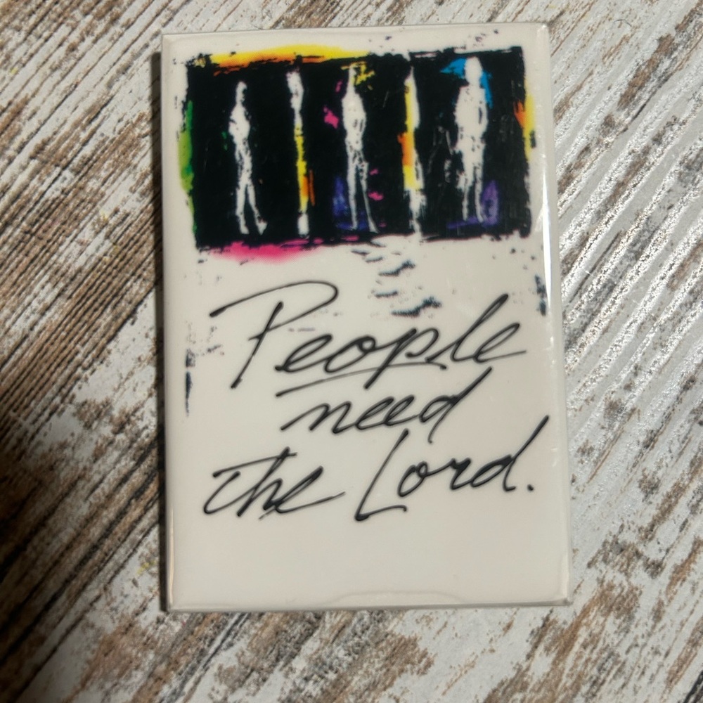 Pin back button  "People Need The Lord," likely associated with the 1989